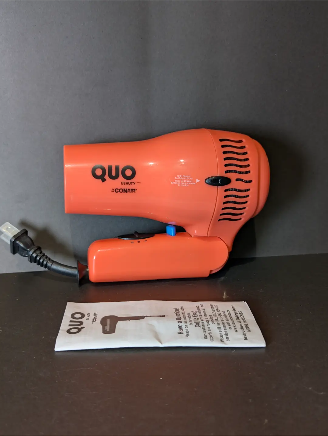 Quo Beauty by Conair Cord Reel Travel Dryer | Dual voltage